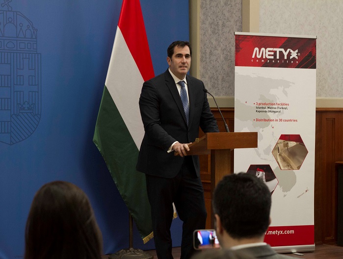 UÄŸur Ãœstünel, Co-Director of Metyx Group, speaking at the press conference in Budapest. © METYX Group
